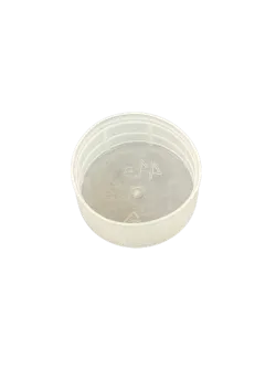 Tapa de plástico para alimentador de goteo al vacío.
