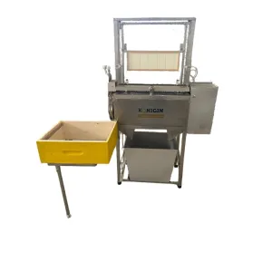 Halbautomatische Entdeckelungsmaschine, komplett mit Sammelbecken für Zellendeckel, Rahmenablage und Honigraumhalter