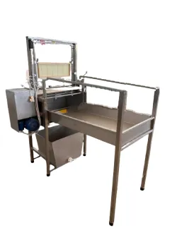 Semi-automatic uncapping machine, complete with opercle collecting tank, frame rack and honey super holder